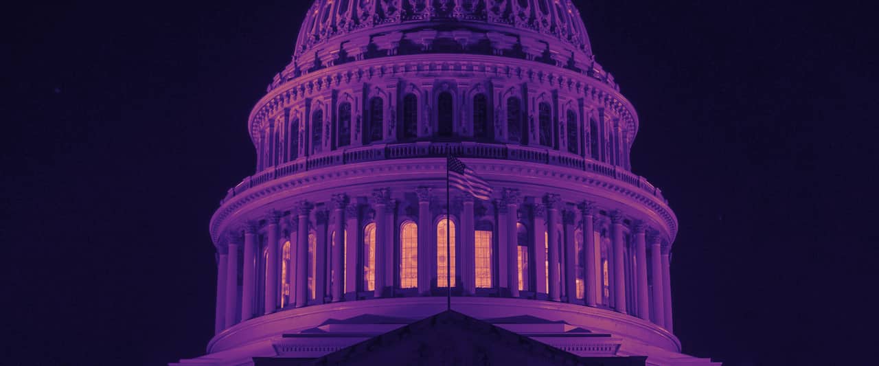 The United States Capitol dome lit at night