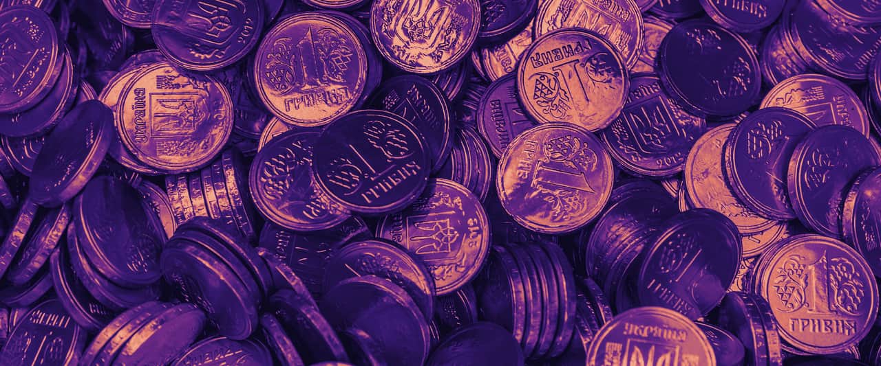 A heap of silver coins filling the frame