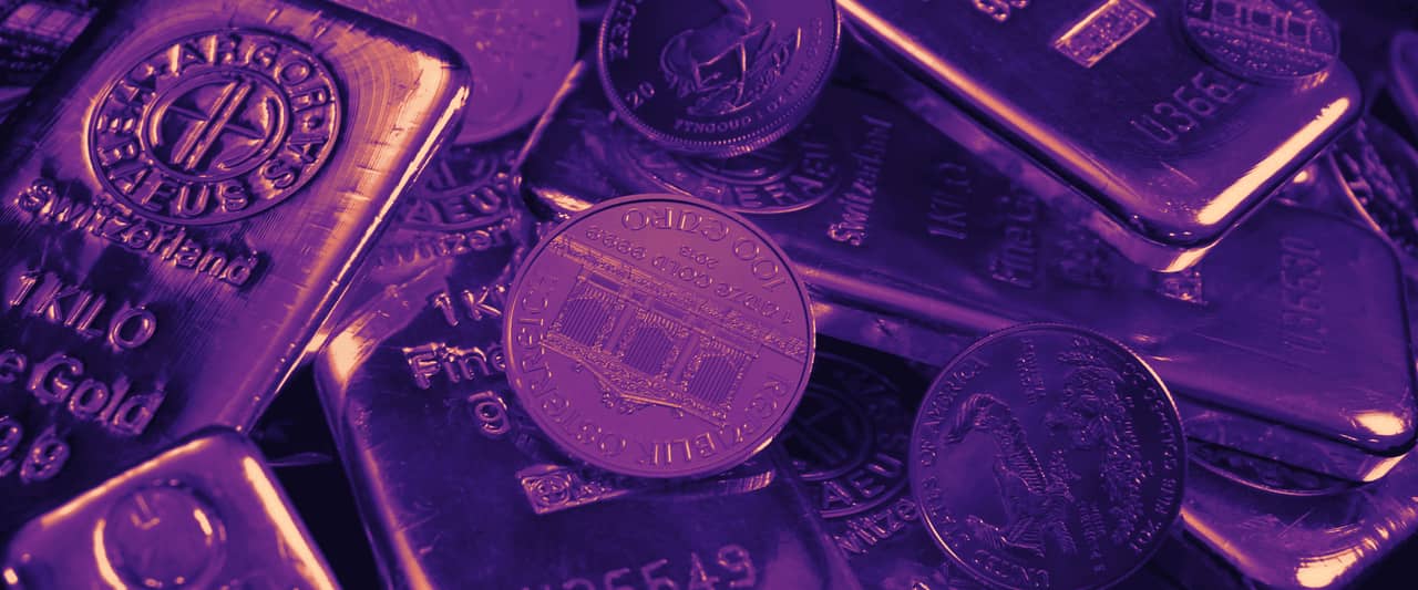 Gold bars and gold coins piled together